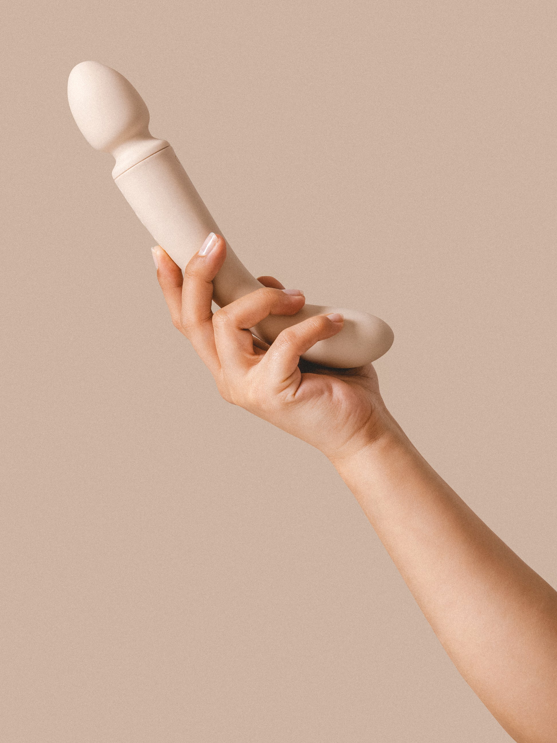  Dual-ended wand vibrator and G-spot vibrating dildo. Sleek design is crafted from an ocean plastic body coated in a buttery soft layer of sanitary grade silicone.