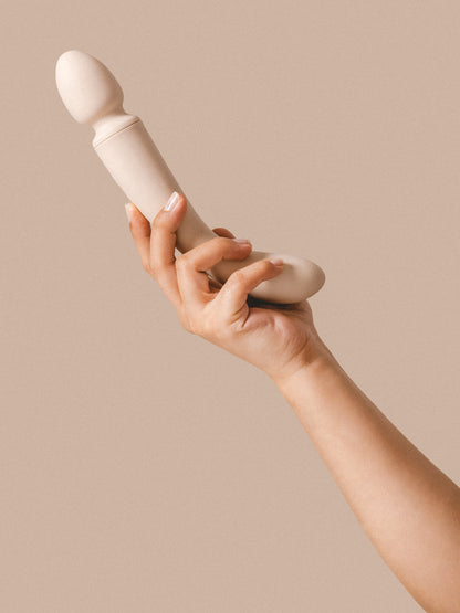  Dual-ended wand vibrator and G-spot vibrating dildo. Sleek design is crafted from an ocean plastic body coated in a buttery soft layer of sanitary grade silicone.