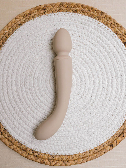  Dual-ended wand vibrator and G-spot vibrating dildo. Sleek design is crafted from an ocean plastic body coated in a buttery soft layer of sanitary grade silicone.