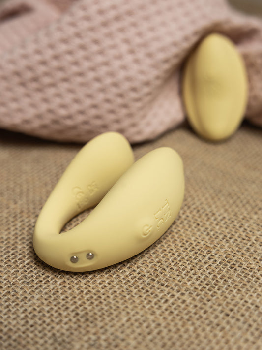 Dual G-Spot & Clitoral Vibrator with Remote Cistus is a remote controlled (remote included) U-shaped vibrator with dual vibrating motors (one at each end), it’s crafted with a recycled ocean plastic internal body dressed in a buttery smooth silicone casing, which comes in a rather dreamy creamy yellow hue.