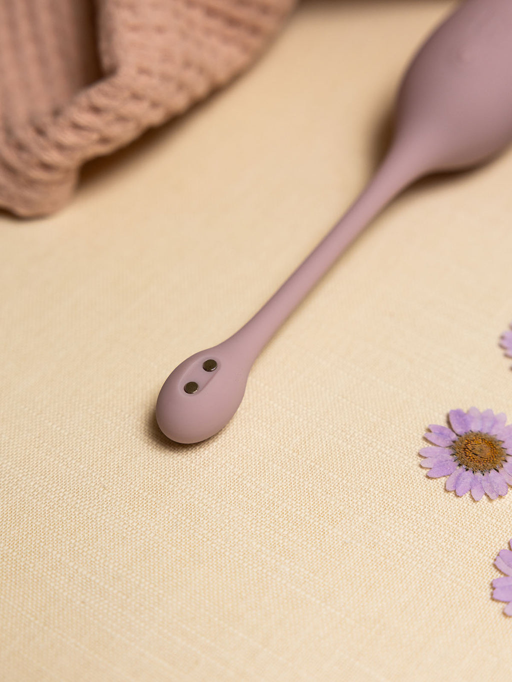 Love egg in pastel purple,silicone, its core made recycled ocean plastic.A vibrating love egg is a sex toy which you glide into your vagina and control remotely, wearable with panties or other clothing, perfect for discreet public play. They work by tantalising the walls of your vagina and g-spot as you scroll through the vibration patterns. Vibrating love eggs are a super versatile sex toy as the strong vibrations can be used to stimulate your clitoris and other erogenous zones.